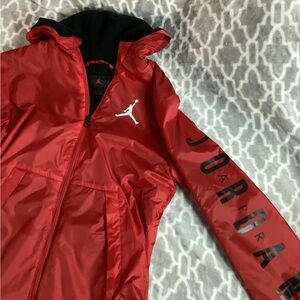 New Jordan Red Hooded Jacket/ Windbreaker with Logo (only tried on)